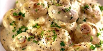 Knoblauchpilze in Parmesankäse